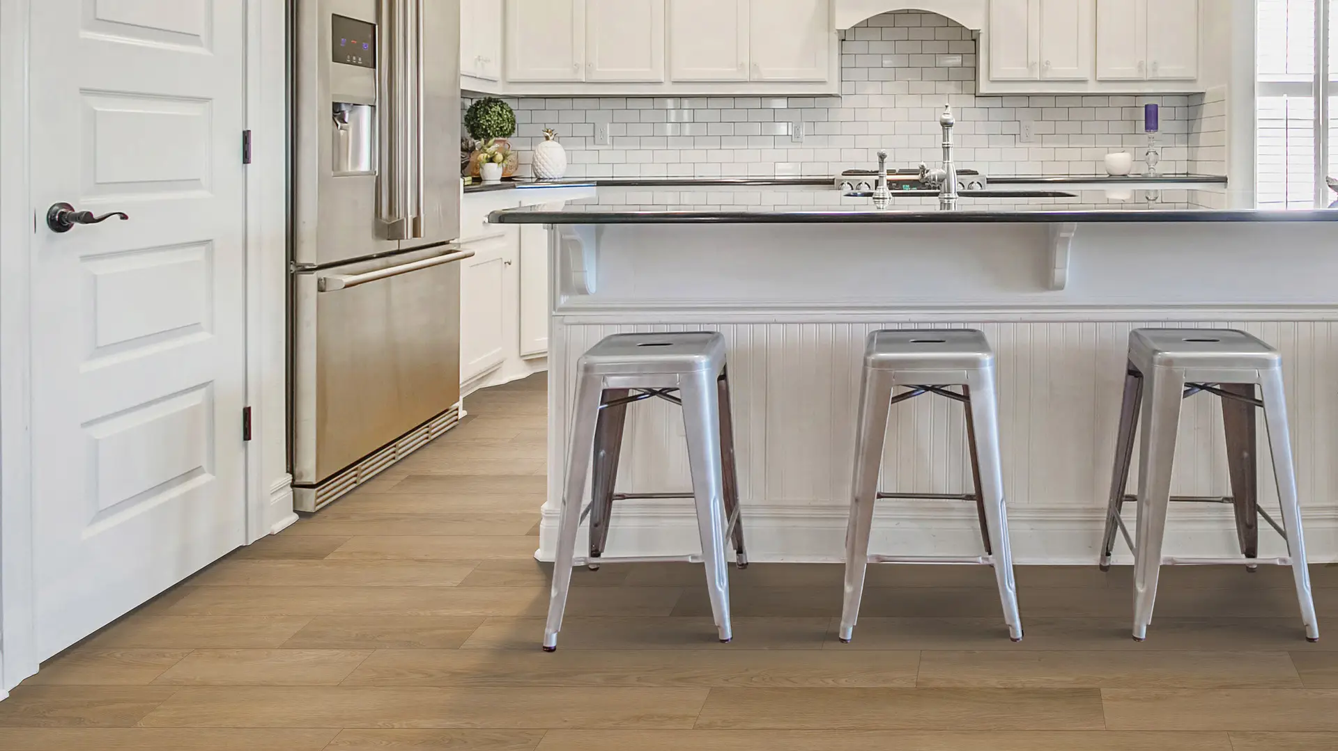 Luxury vinyl flooring in a kitchen, installation services available